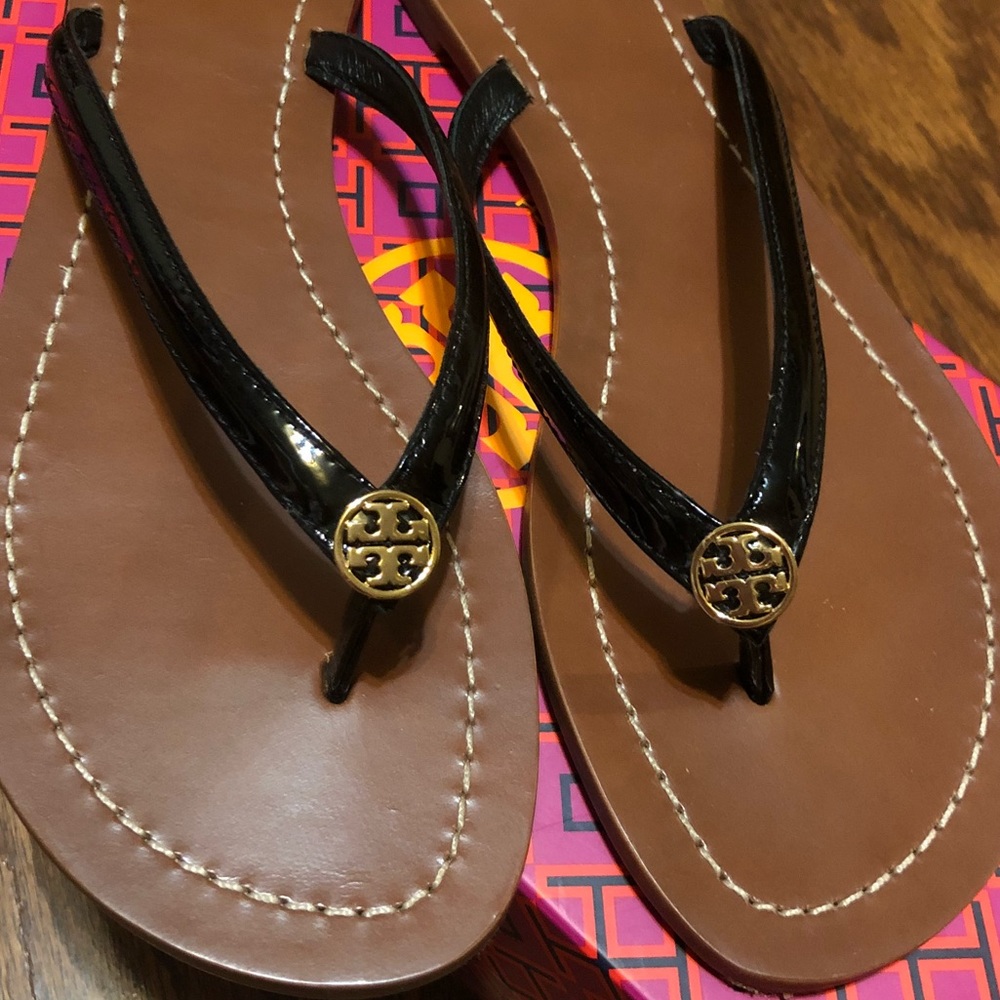 NEW gorgeous black patent flip flops.